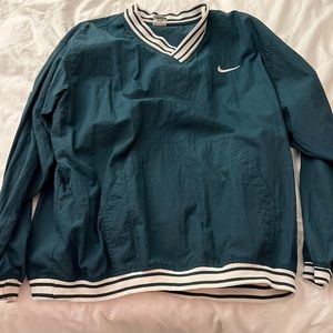 Green vintage Nike windbreaker jacket.